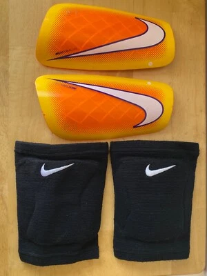 NIKE MERCURIAL LITE SHIN GUARDS SOCCER AND NIKE STREAK VOLLEYBALL KNEE PADS - Image 1 of 4
