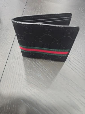 Cartera de cuero plegable Gucci Signature Web - negra con rayas Foto 1 de 4