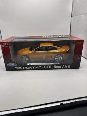 Imperfect 1:24 Diecast Welly ORNG 2005 PONTIAC GTO RAM AIR 6 - Image 1 of 4