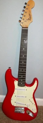Squier Mini Precision Bass Dakota Red 6 String Electric Guitar  - Image 1 of 4