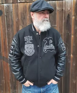 Collegejacke L H&M Baseballjacke mit Stickerei und Patches schwarz Bomberjacke - Bild 1 von 10