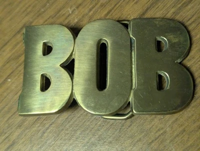 1970s Vintage BOB BELT BUCKLE Brass BOLD Name Retro Hippie Western Cowboy Shiny - Image 1 of 4