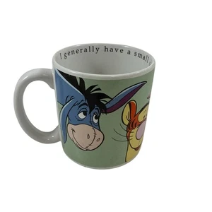 Taza Disney Winnie The Pooh "GENERALMENTE TENGO ALGO PEQUEÑO SOBRE AHORA" - Imagen 1 de 4