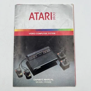 SOLO MANUAL DE INSTRUCCIONES - Sistema informático de video Atari 2600 modelo CX2600 - 1983 - Imagen 1 de 3