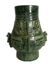 Chinese Cast And Part Carved green vase in an archaistic style.