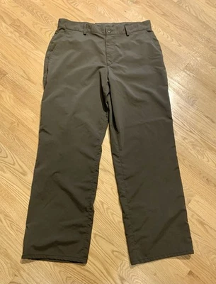 Pantalones de golf Under Armour para hombre 34x29 verdes atléticos caminata elásticos chinos rectos Foto 1 de 4