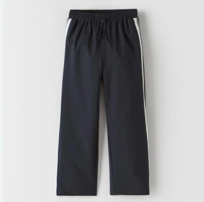 Pantalones laterales a rayas mezcla viscosa azul marino/negro 7 nuevos con etiquetas Zara para niñas pequeñas Foto 1 de 4