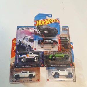 Hot Wheels 5 Toyota Tacoma Target Red Edition & Silver Series  - Bild 1 von 17