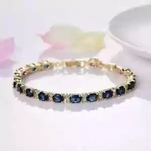 8Ct Oval LabCreated Blue Sapphire Women's Tennis Bracelet 14K Yellow Gold Plated - Picture 1 of 5