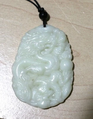 Dragón de cuarzo blanco--colgante--amuleto--dije. Foto 1 de 4