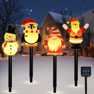 Paquete de 4 luces solares de Navidad para exteriores Papá Noel muñeco de nieve gnomo pingüino 8 modos de decoración - Imagen 1 de 7
