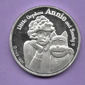 CARTOON CELEBRITIES - PICCOLO ORFANO ANNIE & SANDY .999 ARGENTO TONDO - Foto 1 di 2