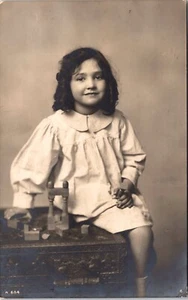 PORTRAIT OF AN ADORABLE LITTLE GIRL : PLAYING WITH BLOCKS : ROTARY PHOTO : RPPC - Picture 1 of 2