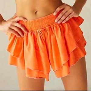 Pantalones Cortos Free People Movement Prima Capas Naranja Lyocell - Medianos - Imagen 1 de 11