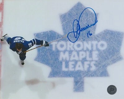 Darcy Tucker Toronto Maple Leafs Skating Over Leafs Logo Autographed 8x10 Photo - Image 1 of 4