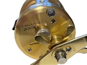 Carrete de baitcasting derecho Shimano Calcutta 200XT usado enviado desde Japón - Imagen 1 de 8