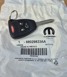 2008-2012 Jeep Liberty NEW Genuine MoPar KEY BLANK TRANSMITTER - Picture 1 of 2