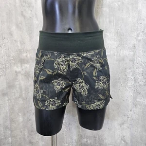 Athleta 0 Trekkie North bedruckte Shorts grün Blumen Reißverschlusstaschen Fitnessstudio Outdoor - Bild 1 von 8