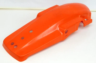 Guardabarros trasero genuino OEM Suzuki DS100 DS125 DS185 plástico naranja 63113-48501 usado Foto 1 de 4