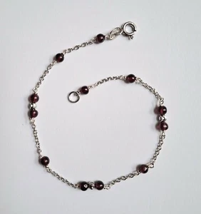 Bracciale in argento 925 con sfere di argento sfaccettate e granato rosso - Foto 1 di 3