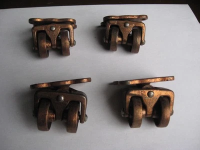 4 Antique Cast Iron Phoenix Caster Co. Dual Wheel Swivel Casters- NOS - Image 1 of 4
