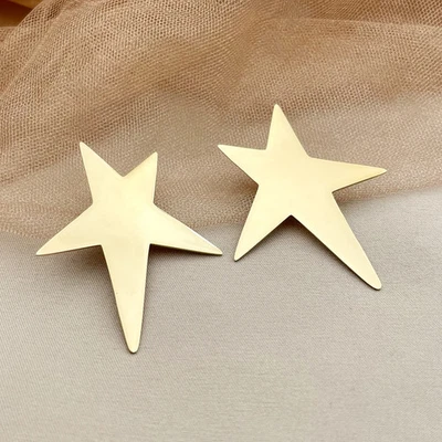 Aretes estrella de acero inoxidable para hombre tono dorado brillo estilo borde joyería Foto 1 de 4