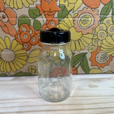 Biberón vintage de vidrio en relieve Evenflo 4 oz. Hecho en USA con tapa sin pezón Foto 1 de 4