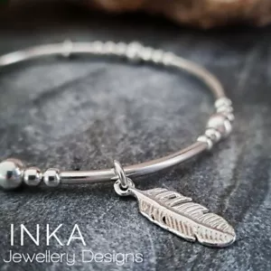 Inka 925 Sterling Silver bead & noodle Stacking Bracelet with a Feather charm - Picture 1 of 9