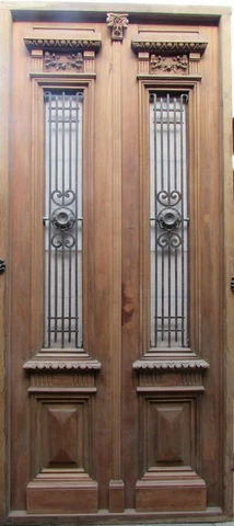 Double antique entry door with iron insert Cover