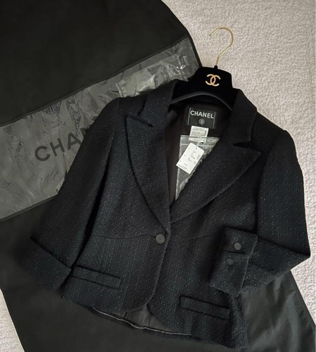 Rara giacca sartoriale Chanel in tweed nero 36