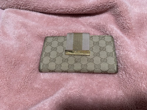 Autentico portafoglio lungo Gucci GG rivestito in pelle tela
