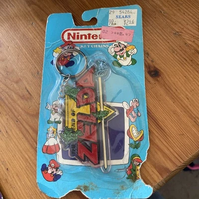 The Legend of Zelda 1989 Nintendo Power Keychain NES era Still Sealed Key Chain - Image 1 of 4