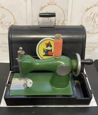 Mini máquina de coser vintage original de juguete para niños en estuche de baquelita URSS funciona Foto 1 de 4