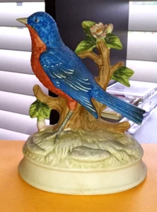 Caja de música vintage Gorham Bisque porcelana pájaro azul estatuilla-sintonización amanecer puesta de sol - Imagen 1 de 3