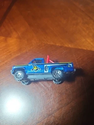 Camioneta pickup Dodge Dakota Monkey 1987 Matchbox azul fundido a presión 1:63 2 7/8" Foto 1 de 4