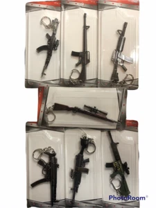 GUN KEYCHAINS set of 7 metal weapon key rings Rifle M16 AK47 Uzi M249 machine - Imagen 1 de 1