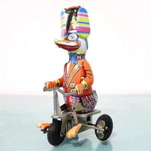 TIN TOY Vintage TOP Wind Up Driving Cycling HELICOPTER Head! Donald Duck Working - Picture 1 of 24