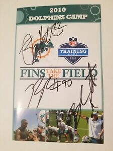  MIAMI DOLPHINS. AUTOGRAPHED 2010 CAMP ROSTER CARD.