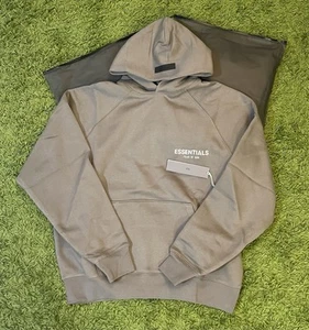 *NUEVO* Auténtica Sudadera con Capucha Fear Of God Essentials Taupe - Talla Mediana Nueva - Imagen 1 de 1
