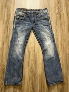 Pantalones de mezclilla ROCK REVIVAL para hombre 34x31 MANNIX corte bota agujeros desgastados DEFECTOS LEER - Imagen 1 de 10