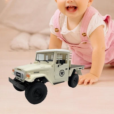 Veicolo elettrico giocattolo ricaricabile in scala 1/16 RC fuoristrada - Immagine 1 di 4