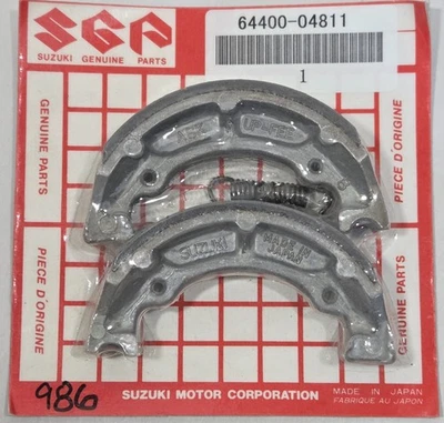 NOVO 1985-2006 Genuíno Suzuki JR50 Conjunto de Sapatas de Freio com Molas JR 50 OEM 64400-04811 - Imagem 1 de 3
