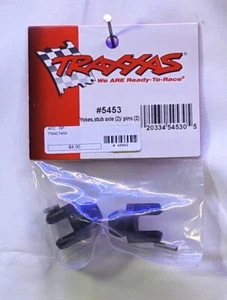 Traxxas TRA5453   Yokes, stub axle (2)/ pins (2)  ** FAST Shipping ** - Picture 1 of 1