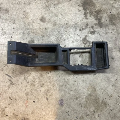 Jeep Cherokee XJ 1984-1996 consola central moldura de cambio OEM negro Foto 1 de 4