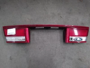 FORD LASER KJ 10 / 1994 - 12 / 1996 REAR GARNISH S2 CLEAR - Picture 1 of 2