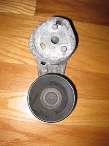 98 JAGUAR XJR ENGINE MOTOR BELT TENSIONER IDLER PULLEY BRACKET OEM USED - Picture 1 of 1