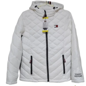 Chaqueta blanca con capucha empacable para mujer Tommy Hilfiger - Imagen 1 de 10