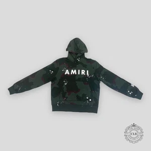 SUDADERA CON CAPUCHA CON LOGO DEL EJÉRCITO AMIRI - CAMUFLAJE - Imagen 1 de 6