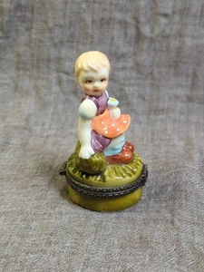 Vintage Porcelain Girl W/Flower Sitting Down Trinket Box - Picture 1 of 9