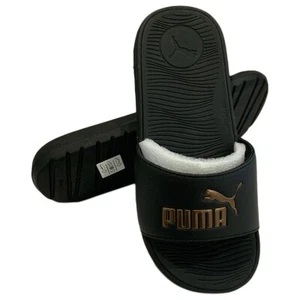 UVP $ 48,99 NEU MIT ETIKETT PUMA COOL CAT BOLD DAMEN SCHWARZ GOLD SLIPPER PANTOLETTEN SANDALEN - Bild 1 von 2